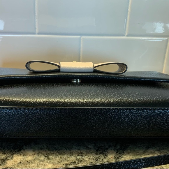 BUY IT NOW. NWOT, Kate Spade Robinson Street Crossbody Handbag Black/cream bow. - Picture 7 of 10